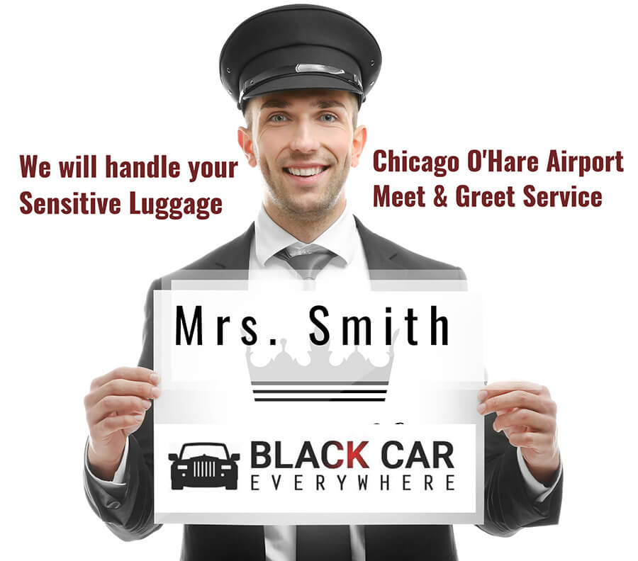 Chauffuer standing With name sign for Meet and greet