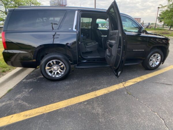 Sideview of Black Chevy Suburban