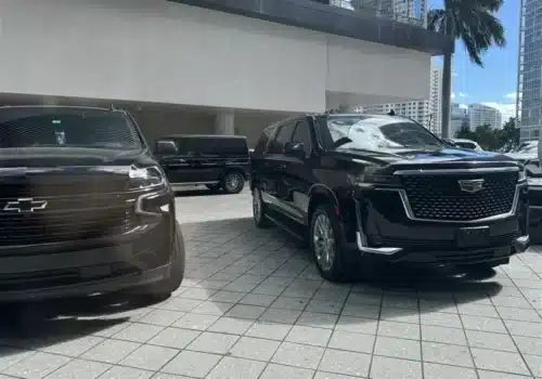Front View of 2 Black VIP SUVS