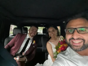 Chauffeur with Wedding Couple
